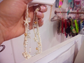collar de conchas y estrellas
